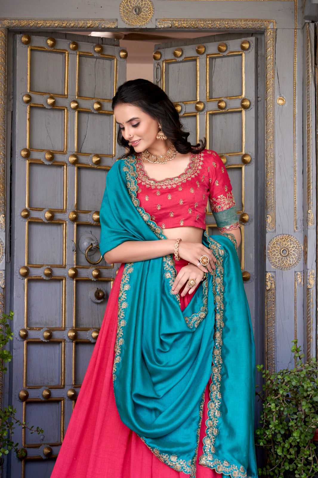 Rani Pink Lehenga Choli with Teal Blue Embroidered Dupatta